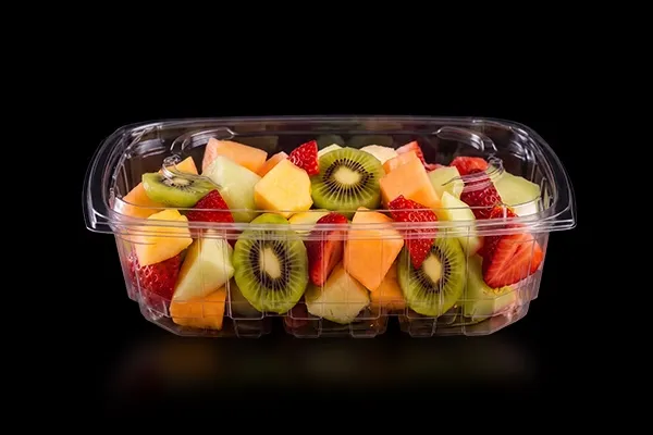 Cut fruit in a clear Lucid Infinity tray on black