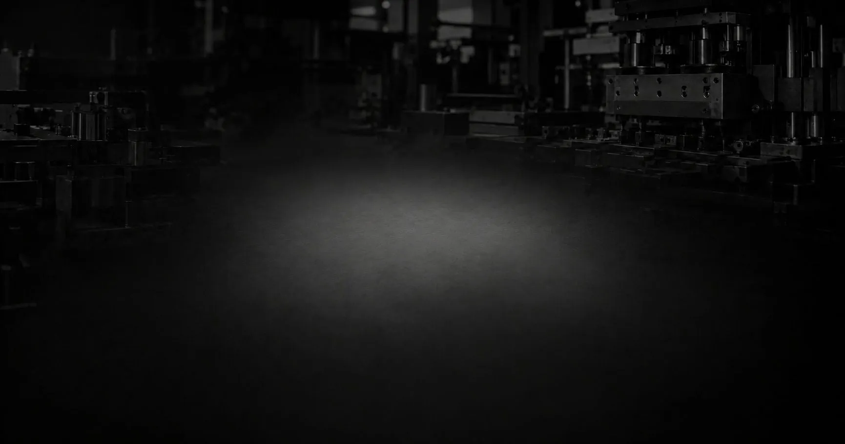 Thermoforming line inside the Lucid factory, in low light